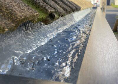 Finlock Concrete Gutter Lining | Derek Taylor Roofing & Property Maint